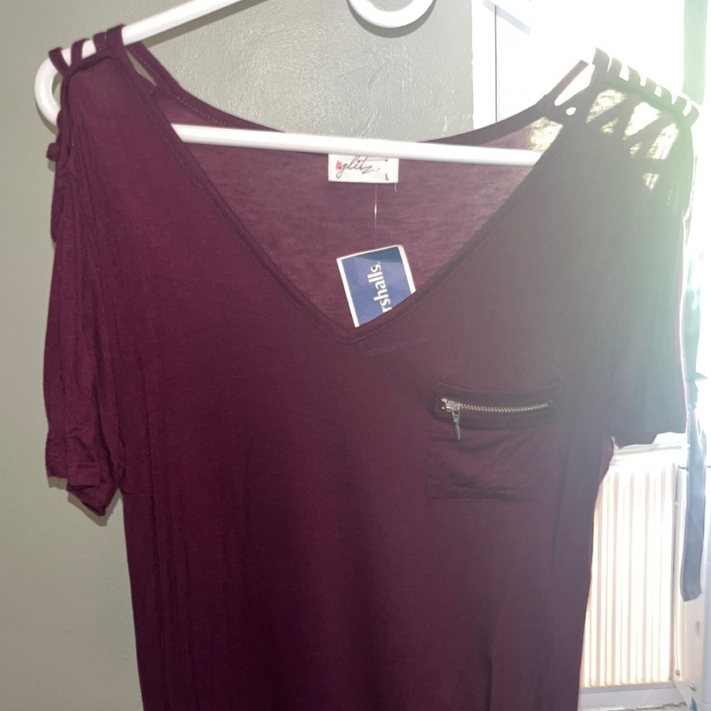 A blouse size Large with tags brand glitz